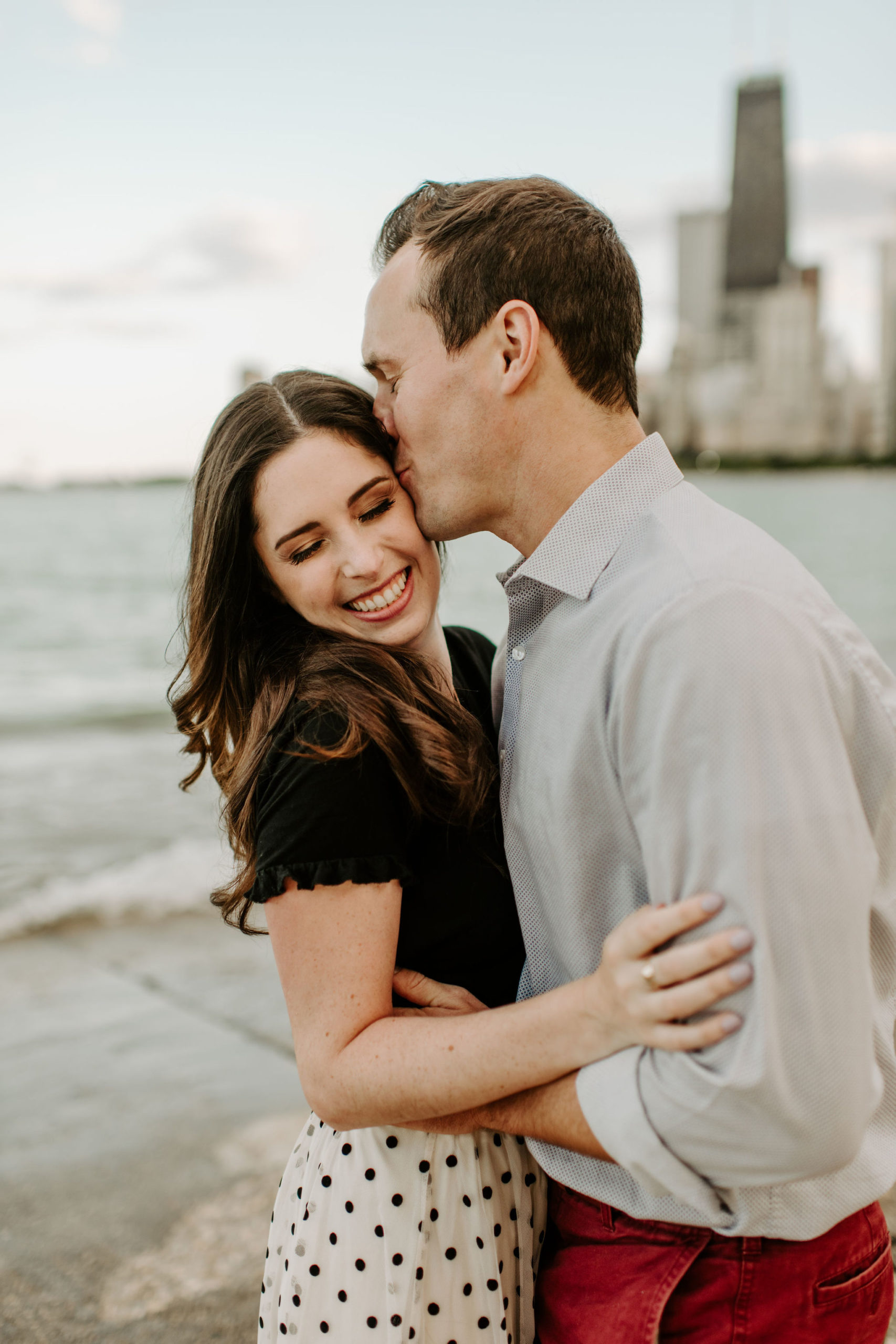 North Avenue Beach Engagement Session by Photographs by Teresa. Includes posing inspiration for an outdoor couples session. Book your couples session and browse the blog for more inspiration
